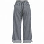 Pantalone effetto jeans a gamba larga con risvolto